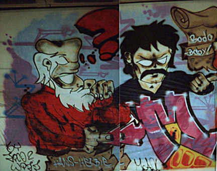 Faschingsfete LiLaBe 1989. Ein Graffiti-Auftrag für Hans Bhrs Veranstalter Faschingsfest LiLaBe in der Fachhochschule Bergedorf/Hamburg. Auftragsmalerei von der Mad Artists Cooperation, Siko Ortner (ehemals für Auftragsarbeiten Zico) und seinem Graffitischüler Wizz. im Februar 1989. Fertige Character Hans Herbie und Bodo Baby für 11m x 3m Dekorationsfolie, Faschingsfest LiLaBe 1989.